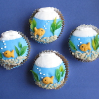 Fish Bowl Cupcakes Quick Fish Bowl Cupcakes for my daughter's 4th birthday. Inspiration from "Hello Cupcake".Confetti cake, store bought icing...