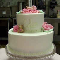 My Baby Shower Cake 10" white cake iced with vanilla butter cream icing ,6" strawberry cake iced with vanilla butter cream icing. Fondant roses, baby...