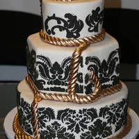 Ivory Black And Gold Rope Elegant Cake with Gold ropes for a little extra pop