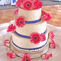 Royal And Gerberas Piping meant to look like the brides dress;