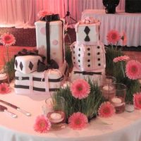 Scattered Wedding Gifts This was a cake for a bride who wanted more of a "scattered" look. She had an inspiration she found online (I don't know who...