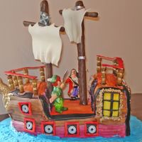 Captain Hook's Ship This was a cake my husband designed for a Peter Pan themed party. It is his baby....all I did was bake and make fondant. Both of the...