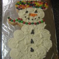 Pull-Away Snowman Cupcake This snowman is made of cupcakes and decorated with buttercream and jelly beans, thanks for looking :)