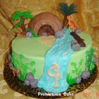 Prehistoric Cake 12" Chocolate/Sour Cream cake with Oreo Filling, Cake on tip was made in ball pan, Rocks are Cake balls. This cake was made for a...