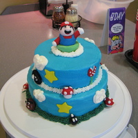 Blake's 6Th Birthday 2nd year in a row my son has picked Mario. WASC with buttercream and fondant characters. TFL