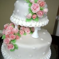 2-Tier Fondant Wedding-Style Cake I made this for my Wilton Course III final. I actually did this at home on my own, as illness kept me from getting to the final class. This...