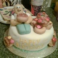 Homer Simpson Donut Cake I made this for my housemate's 21st - she loves the Simpsons and it took me a while to think of how to do it! It's a victoria...