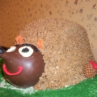 Hedgehog Cake lemon cake with buttercream icing. Giant Hershey Kiss for the head.