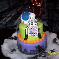 Beetlejuice This is a cake I made for halloween/step-dad birthday/aunt birthday. My step dad was beetlejuice and my aunt was a bingo card. Figure is...