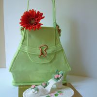 Fancy Shopping !!! All edible, purse made of fondant, shoe and flower made of gumpaste.