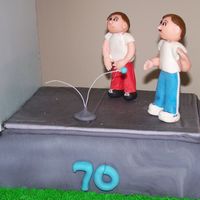 Handball Cake Two tier cake, bottom tier covered in grass and the top has a handball court on it. The people are based on the tutorial by aine2. getting...