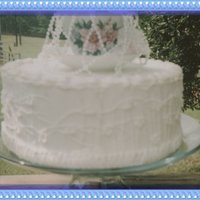 Anniversary With Heirloom Teacup Did this one for a small anniversary...buttercream with vines and leaves on the side...china teacup and saucer with pearls.