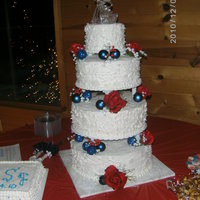 Sister's Christmas Wedding 4 tiers...double layered...cho, butter recipe, fun fetti flavors...sugar shack buttercream. Did spackling on sides before frosting crusted...