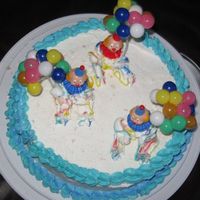 Clown Cake! From Wilton Course 1 - all done in butter cream except heads and balloons. :)
