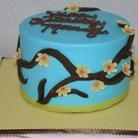 The Jaleigh Cake Chocolate cake covered in BC. Flowers and branch GP