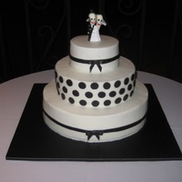 Dots And Bows My first real wedding cake. All BC with fondant accents. I need to work on my BC. It did not ture out as nice as I wanted.
