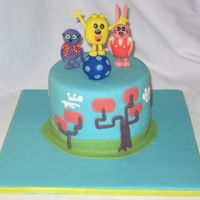 Wow Wow Wubbzy Yellow cake with Chocolate BC filling. Covered in MMF and GP figures. Ball made from Rice Krispy covered in MMF. Thanks for looking!