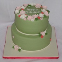 60Th Birthday Made this for a friends 60th birthday. Yellow and Marble cake coverd in MMF with GP flowers. Thanks for looking