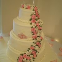 My First Wedding Cake! Wasc 14", 12", 10" and 6". First time doing roses, wedding cake, 4 tiers, monogram plaque, lots of firsts but glad for...