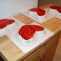 Steak Cakes Covered in fondant and hand painted...even with the USDA Choice stamp on the side. These were for a BBQ for a local business. Yep, I had to...