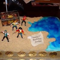 Aaargh! Piping gel for water, nilla wafers for sand, BC frosting for the rest