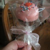 Cupcake Pops Red velvet cake covered with candy coating and placed on a stick