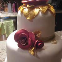 Anniversary Cake White cake filled with Vanilla Buttercream. Bottom and top teirs also filled with strawberry filling center teir with pineapple.