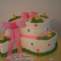 Little Girl's Baby Shower Cake Top tier chocolate on chocolate and bottom tier yellow cake with buttercream