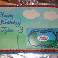 Thomas And Friends Birthday cake for my son's birthday party. A wind up train went on the track.