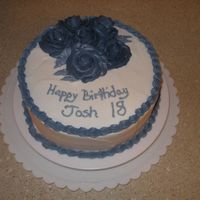 Birthday Cake Birthday cake for my 18 year old nephew. He's in a rock band and I thought he would appreciate the dark grey flowers.