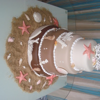 Beach Wedding Cake Delicious vanilla cake with brandy sirop covered with chocolate fondant....
