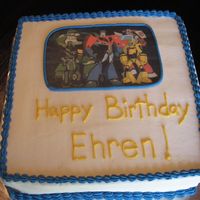 Transformers! 8x8 square cake, 2 layer, white cake colored green with sprinkles mixed in! My first time using an edible image.