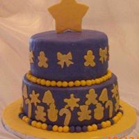 Happy Holidays! 10" dark chocolate with mocha bc. 8" WVSC with mocha bc. Covered in Michele Foster's fondant. Donated for a teacher...