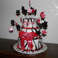 Steff Dark Chocolate with Chocolate Butter cream covered in Michele Foster's Fondant. 10", 8" and 6". Inspired by a cake from...