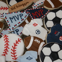 Sports Cookies Made these for my sister's sports themed baby shower. NFSC with Antonia74's royal icing. Was really happy with the way they...
