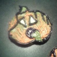 Zombie Pumpkin I made some zombie pumpkins for a friend who loves zombies... decorated with royal icing... TFL