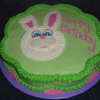 Bunny White buttercream bunny on green background