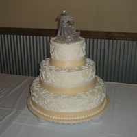 Wedding 6", 10", 14" round - off white BC with white scrollwork and dots; off white MMF ribbons and covered board.