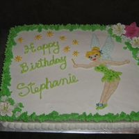 Tinkerbell Tinkerbell with leaf border and royal icing lillies