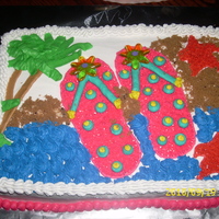 Flip Flop Cake French vanilla cake all buttercream except for the flowers at the toes.
