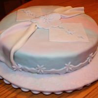 My First Fondant & Gumpaste Cake Ever! My first fondant and gumpaste cake ever. Loved learning the sash and handkerchiefs! We had to cover the cake board also. It was a chocolate...