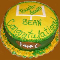 Congratulations Cake My husband got a new job as a manager in the government. He loves the Green Bay Packers so my sis and I used the football and gold and...