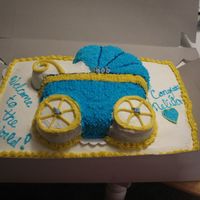 Baby Carriage Sheet Cake Full sheet cake with buttercream icing. Carriage cake on top. This was alot of cake and luckily was mostly eaten with the large crowd we...
