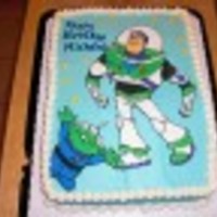 Buzz Lightyear I made the figure out of color flow. I think it came out okay. It cracked when we got to the party.