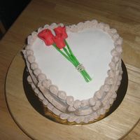 Anniversary Made for my Aunt and Uncle. Butter Pecan cake filled and iced with pralines and cream BC. Filling and detail icing has crushed pecans mixed...