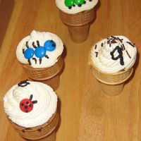 Ice Cream Cone Cupcakes Ice cream cone cupcakes, decorated with smarties to look like bugs for a boys 9th birthday.