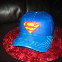 Superman Hat Gumpaste brim and cake covered in MMF.