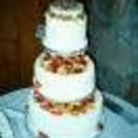 E&m Wedding Cake Basket weave cake w/ marzipan animals hedgehogs, squirrels woodsy animals with white choc. logs. cake was sour cream white with pecans,...