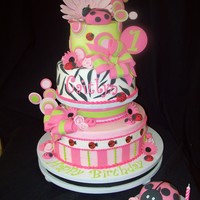 Lady Bugs And Zebra A sweet and sassy first birthday cake.