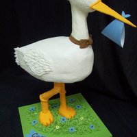 Stork 3D Stork is iced with Buttercream. Legs are PVC covered with fondant. Cake stands 22" tall.
